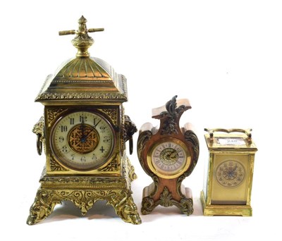 Lot 248 - A gilt metal mantel timepiece; a brass carriage timepiece; and a modern timepiece (3)