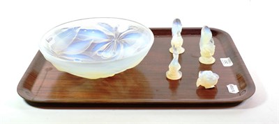 Lot 263 - A G Vallon iridescent glass dish, cherry pattern; together with four Sabino figures (5)