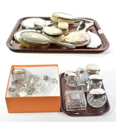 Lot 265 - A quantity of silver-mounted dressing-table jars and other dressing table items, including:...