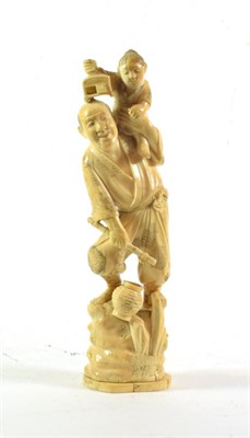 Lot 282 - A 19th century carved ivory okimono