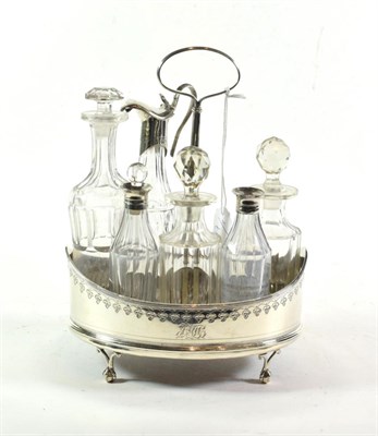 Lot 284 - A George III silver cruet frame, Robert Hennel, London 1791, with a part set of bottles, some...