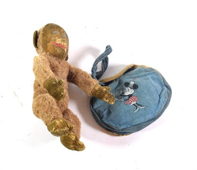 Lot 306 - A Merrythought monkey and a Minnie Mouse purse
