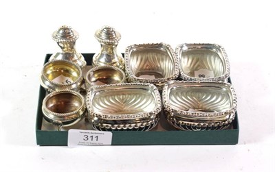 Lot 311 - A six-piece silver condiment-set, the salts Chester and Birmingham, the pepperettes...