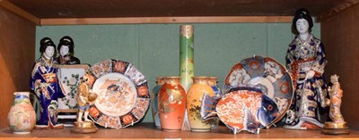 Lot 322 - A Japanese Imari charger; two 19th century Imari plates; two Satsuma figures; two Chinese porcelain