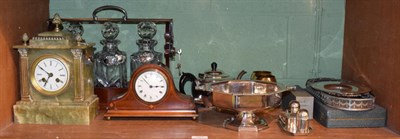 Lot 323 - An onyx clock; an Edwardian clock; a tantalus; and plated wares