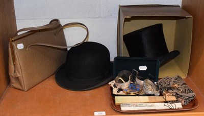 Lot 339 - A gents top hat by Isaac Searth, Guisborough; a bowler hat; ostrich skin handbag; together with...