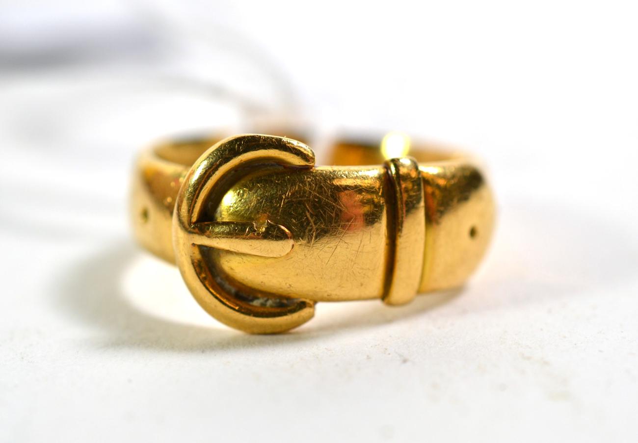 Lot 356 - An 18 carat gold buckle ring, finger size N