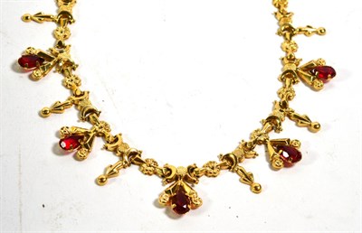 Lot 357 - A necklace stamped '750' set with red glass stones, length 46cm