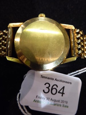 Lot 364 - An 18 carat gold automatic calendar centre seconds wristwatch, signed Buren, Grand Prix, model:...