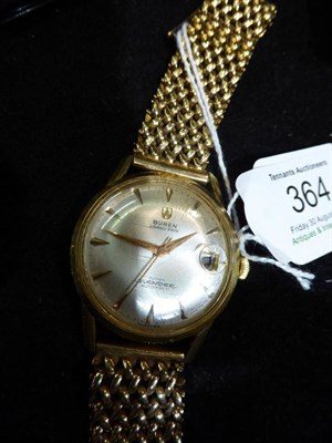 Lot 364 - An 18 carat gold automatic calendar centre seconds wristwatch, signed Buren, Grand Prix, model:...