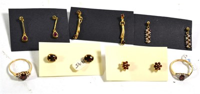 Lot 369 - Two 9 carat gold garnet and diamond rings, finger sizes L and M1/2; together with two pairs of...