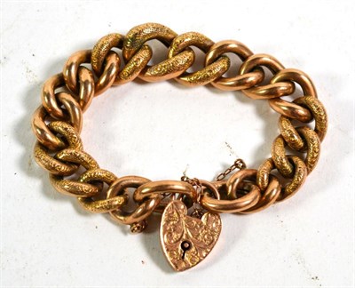 Lot 372 - A hollow curb link bracelet, each link stamped '9C', with a padlock clasp stamped '9CT', length...