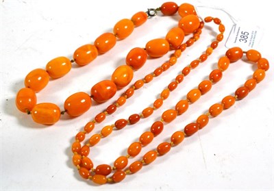 Lot 385 - Two amber bead necklaces, lengths 41cm and 80cm