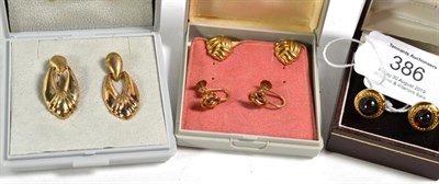 Lot 386 - A pair of 9 carat gold earrings, clip fittings; two pairs of earrings, one pair stamped '9CT'...