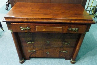 Lot 1628 - A French Empire Mahogany and Ormolu Mounted Secretaire Chest, the staged top above a fall front...