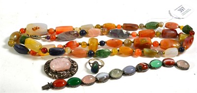 Lot 397 - A hardstone necklace, length 97cm; an opal ring, unmarked, finger size N1/2; a quartz brooch,...