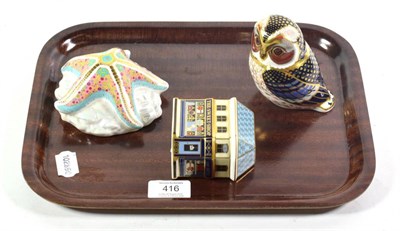 Lot 416 - Three Royal Crown Derby paperweights including Starfish Pop; Tawny Owl; and The Sweet Shop