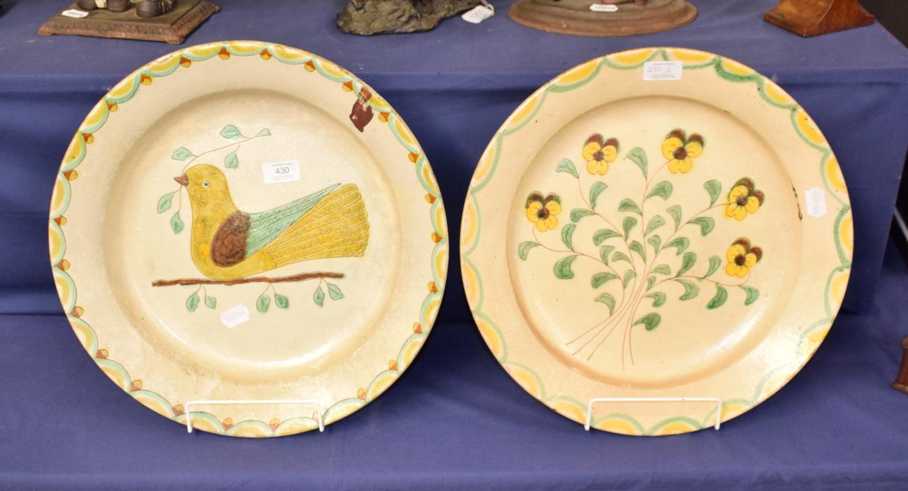 Lot 430 - A pair of country pottery plaques