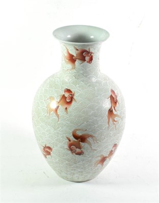 Lot 433 - A Chinese porcelain carved vase decorated with fish