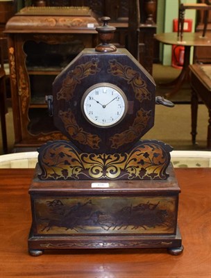 Lot 456 - ~ A regency style rosewood brass inlaid mantel timepiece