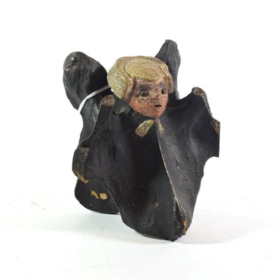 Lot 461 - A 19th century painted and carved horse vertebrae in the form of John Wesley
