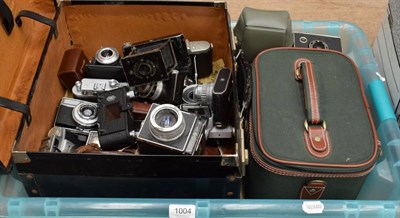Lot 1004 - A box of vintage cameras