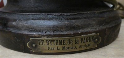 Lot 1012 - A reproduction spelter table lamp after L Moreau, titled 'Le Rythme de la Vague'