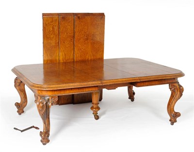 Lot 1638 - A Victorian Brown Oak Extending Dining Table, 3rd quarter 19th century, the rounded rectangular top