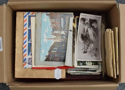 Lot 1026 - A small box of stamps and postcards, a few real photographic, 1908 Franco British Exhibition...