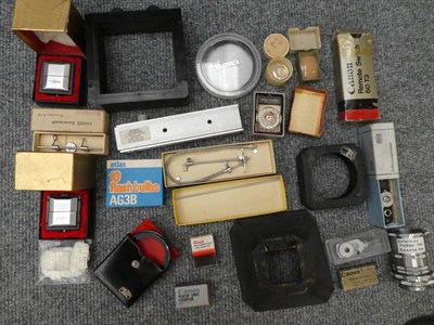 Lot 1032 - Two boxes of Pentax and Leica ephemera; together with a suitcase of photographic equipment