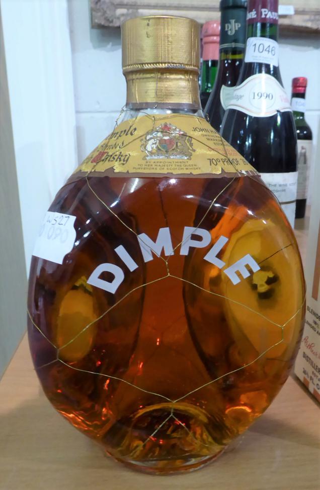 Lot 1044 - A bottle of vintage John Haig dimple blended whisky