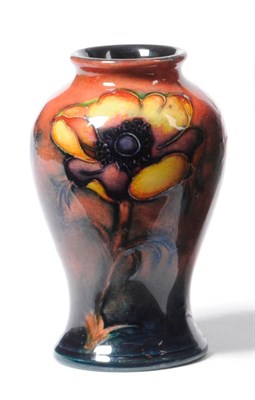 Lot 1659 - A Walter Moorcroft Flambe "Anemone" Baluster Vase, impressed factory marks with facsimile signature