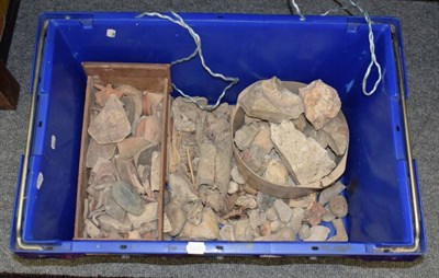 Lot 1263 - A wooden bowl containing clay pipe sections together with a box of pipes, some with silver collars