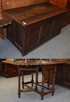 Lot 1274 - A 19th century oak three panel coffer; together with a 1920's oak drop leaf table (2)