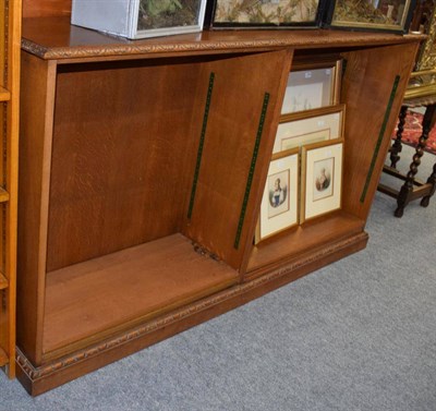 Lot 1276 - Late Victorian carved oak bookcase with six adjustable shelves, 163cm wide