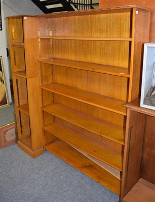 Lot 1277 - Carved oak bookcase of breakfront form, with nine adjustable shelves, 159cm wide