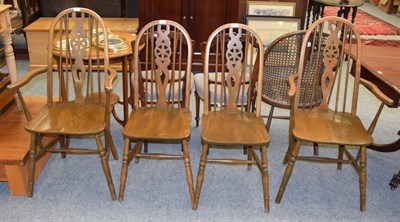 Lot 1286 - Four Wood Brothers solid oak old charm dining chairs (two carvers and two singles)