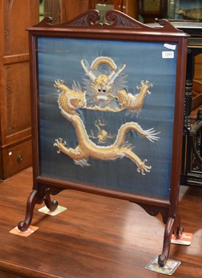 Lot 1293 - An Edwardian fire screen with Chinese padded gold 'Imperial' dragon insert on green silk