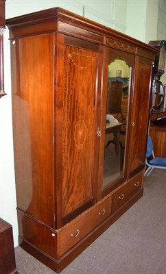 Lot 1319 - Late Victorian satinwood and marquetry inlaid triple door wardrobe