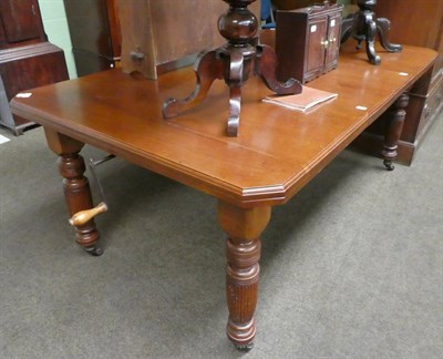 Lot 1321 - A late Victorian walnut extending dining table, with two additional leaves and winding handle,...