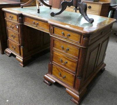 Lot 1329 - Reproduction mahogany desk with green leather top, 136cm wide