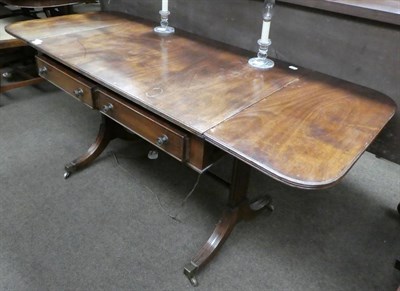 Lot 1336 - George III style mahogany sofa table with two frieze drawers and brass capped feet with...