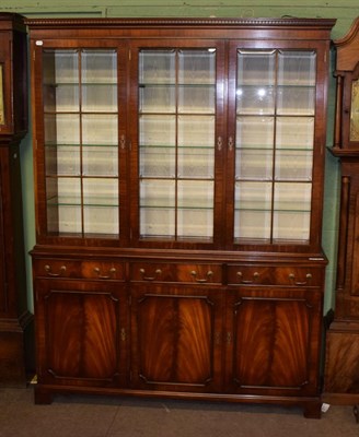 Lot 1339 - Christopher Pratt, a reproduction mahogany and glazed bookcase, 150cm wide