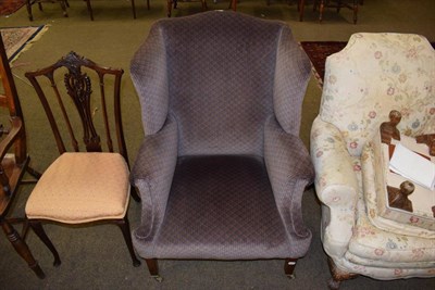 Lot 1346 - A 19th century wingback armchair, recovered in geometric patterned fabric with square tapering legs