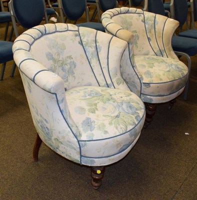 Lot 1350 - A pair of Victorian tub shaped armchairs, circa 1870, recovered in floral fabric with...