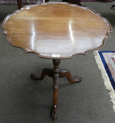 Lot 1364 - George III style flip-top tripod table with moulded top