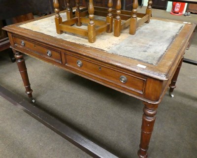 Lot 1376 - A Victorian oak writing table, late 19th century, the moulded top above two real and two sham...