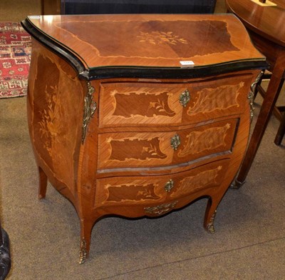 Lot 1379 - A reproduction French marquetry inlaid part ebonised Kingwood three-height chest of drawers