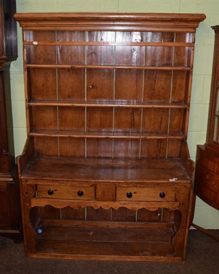 Lot 1393 - A 19th century Irish dresser and rack