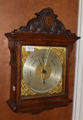 Lot 1413 - ~ Victorian carved oak aneriod barometer with brass and silvered dial inscribed W Dixey, 241 Oxford